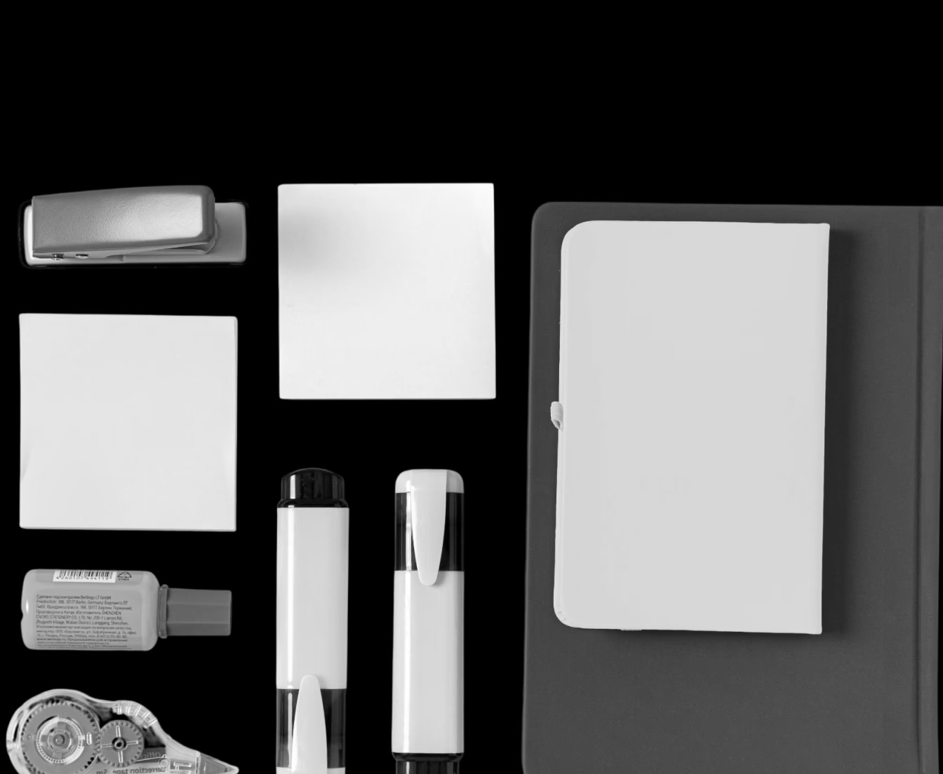 Coaching resources and notebooks arranged on a desk
